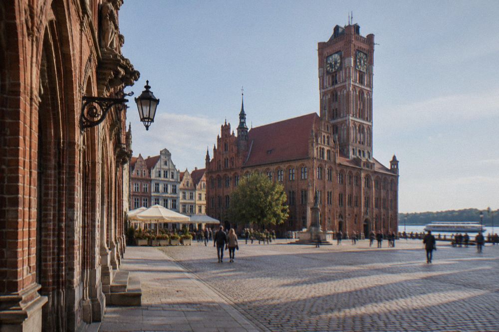 The Old Town Hall and the market square in Toruń seen from the side of the Artus Court