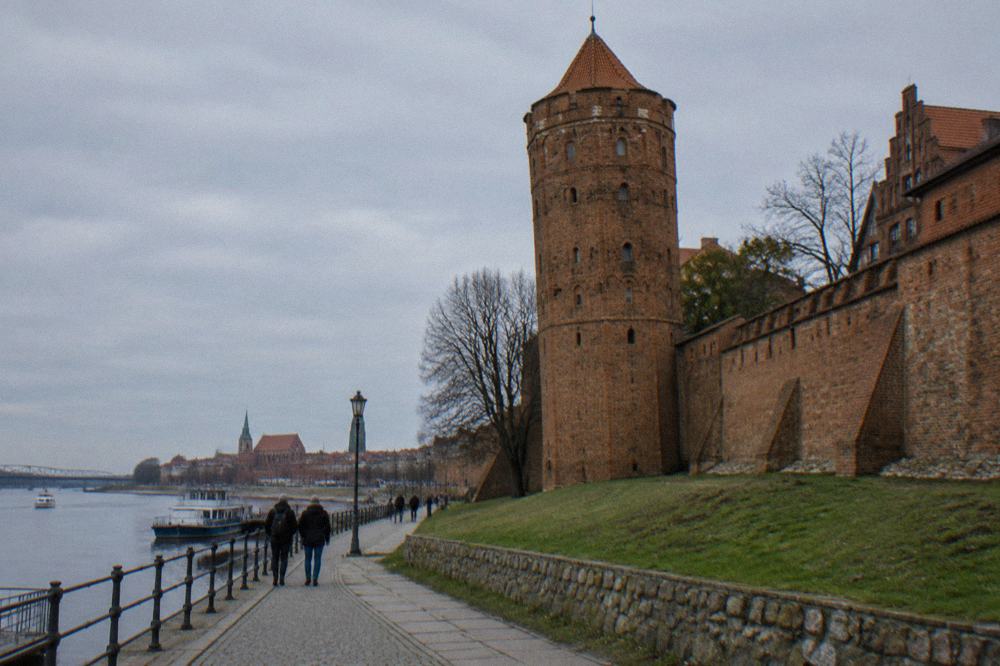 The Leaning Tower of Toruń and the medieval wall on the Vistula side of the old town