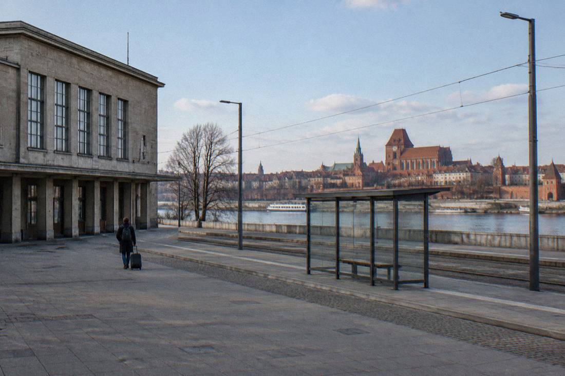 A railway station forecourt on the south bank of the Vistula in Toruń