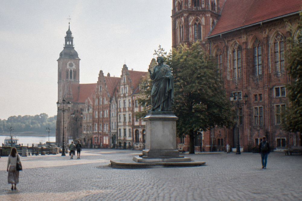 Bronze statue of Nicolaus Copernicus on the market square of Toruń