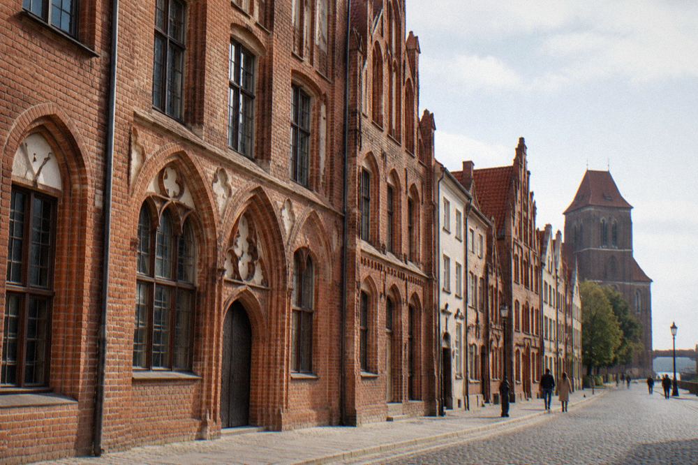Gothic townhouses of Copernicus House on a street in Toruń Old Town