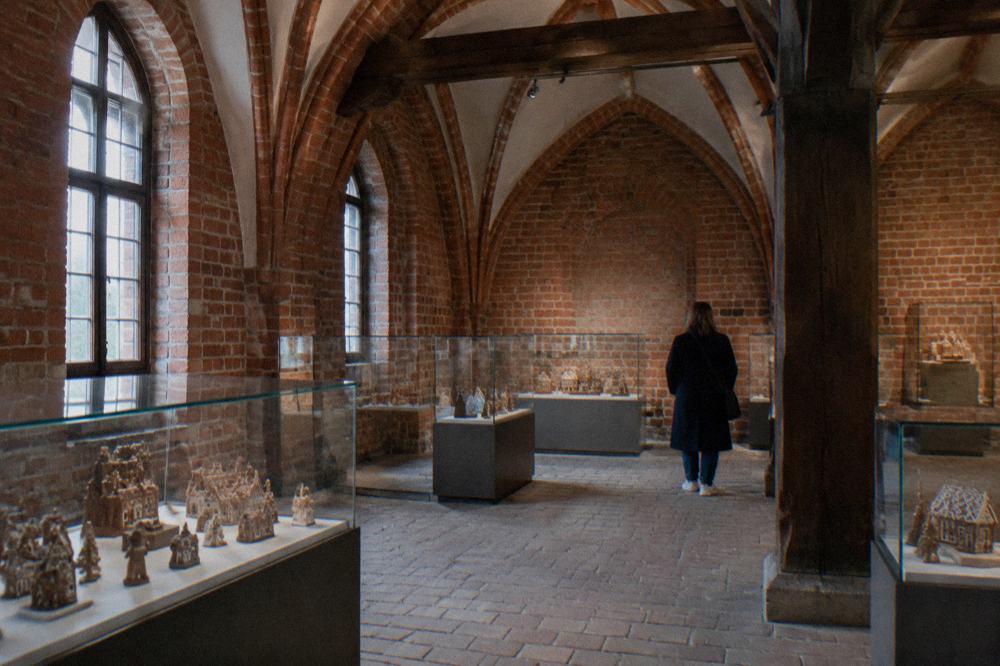 Gingerbread figures and baking displays inside a Toruń gingerbread museum